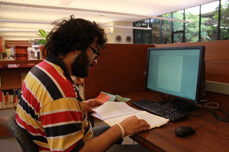 Webbed: Sophomore Akbar Abidi studies in the Pearson Library. The summmer hybrid courses will create a unique learning environment.
Photo by Brennan Whitmore - News Editor