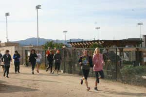 Just do it: 12 members of the SEEds for Haiti club will travel to Haiti over winter break from Dec. 27- Jan.17.  The Trail Run for Haiti 3k or 5k run took place on Dec. 8 at 9 a.m. as a fundraiser for the trip.  Photos by  Kine Rossland- Staff Photographer