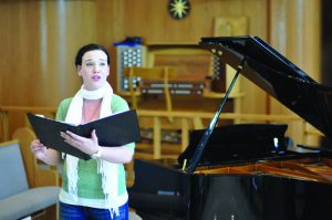 Lifestyles of the musically inclined:  Senior Kiersten Humphries reflects about the influence of family on her love of music and the strict rehearsal regimen for her senior recital. Photo by Alexa Boldt, Staff Photographer 