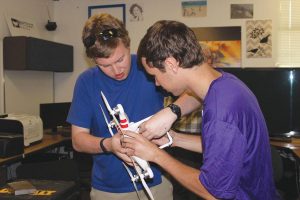 Taking art to new heights:  Seniors Kevin Tanner and Eric Renn will showcase their invention, a plane with a high action camera attached, at CLUFest 2014, debuting in the Kwan Fong Gallery of Art on April 25. Photo by Isebella Del Mese Staff Photographer