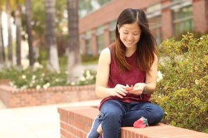 Paper wishes:  Sophomore Eve Ngo faces life with positivity, compassion and just a little bit of whimsy. From surviving childhood disease to heading multiple service projects at CLU, Ngo stands out among the crowd.  Photos by Kayla Gamache, Staff Photographe