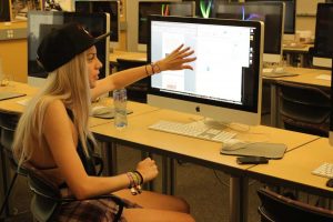 Broadcasting live: Senior Tora Thuland edit their video projects.  Photos by Isabella Del Mese- Staff Photographer