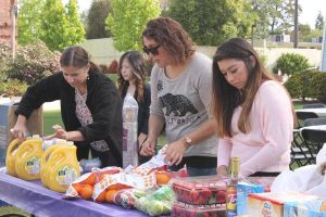 Flock to free food: Students gathered at the monthly Commuter Breakfast for free treats and socialization with other commuters at California Lutheran University on April 23.  Photos by Isabella Del Mese- Staff Photographer