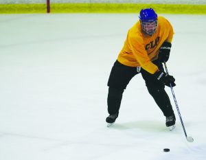 Grinder: Spencer Votipka working on his puck handling at the Knights’ practice at the Simi Valley Iceoplex. Photo by Genesis Rodriguez - Staff Photographer