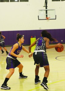 Fundamentals: Sophomore guards Janelle Porter and Sofia Cruz going head to head in practice. Photos by Paulyn Baens - Staff Photographer