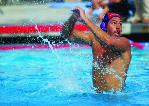 Senior goalie Jesse Owen attempts to save a Pomona-Pitzer shot. Photos by Tina Abbaszadeh - Staff Photographer