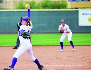 Senior Shonna Christianson pitched five innings and gave up two runs in Sunday's victory over Chapman.  Photos by Mary Case - Staff Photographer. 