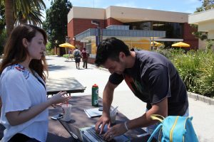 Student Katie Willis was one of the students that petitioned by the spine on April 20 to collect as many signatures as possible with hopes of allowing honors cords at graduation in the future.  Junior Andrew Worthley was one of the students who signed the petition. 