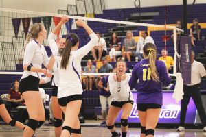 Regals celebrate after winning a point against CMS. Photo by Karina Hernandez - Staff Photographer