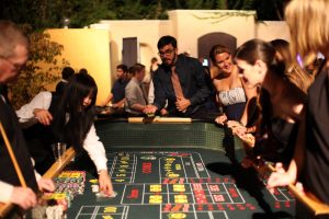 Cal Lutheran students enjoy an evening of craps, blackjack, roulette and poker as they gambled with funny-money for an opportunity to win prizes.  Photos by PK Duncan - Staff Photographer