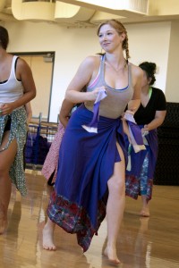 Freshman Heather Wilson-Hooker learns a dance from Ghana, Africa at the Sacred Dance Workshop offered by the Alleluia Dance Theater.