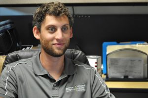 Brett Billet, the new coordinator of recreational sports is now available to answer questions about Cal Lutheran’s recreational sports programs in his office in the Gilbert Sports and Fitness Center. Photo by Eric Duchanin - Staff Photographer