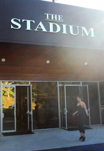 Gym member Megan Harrell moves her workout practice outside.  Photo by Andrew Turley - Staff Photographer