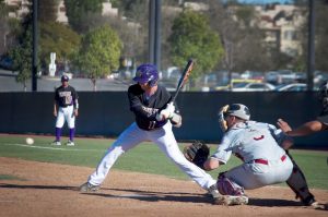 Sophomore infielder Jeff Rebello takes a pitch against Westmont on Feb. 6. The Kingsmen struggled on the mound and at the plate on opening weekend, leading to an 0-2 start.  Photo by Eric Duhanin - Senior Photojournalist