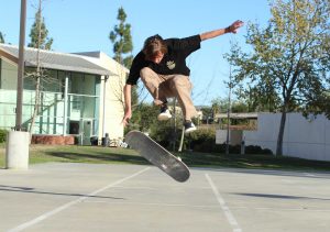 Junior Jani Ertle skates around the Grace basketball courts. Photo by Jackie Rodriguez - Staff Photographer Click here to check out an Echo Exclusive video on skate culture at CLU by multimedia journalist Brady Mickelson.