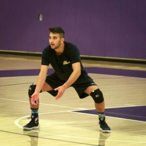 Junior libero Jamal Balkhi prepares to receive a serve during practice. Despite losing its first eight games, the Kingsmen volleyball team has already made strides toward improvement in the young season.  Photo by Eric Duchanin - Senior Photojournalist