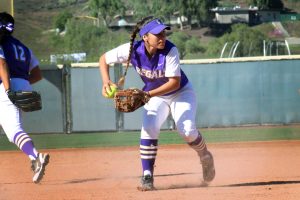 Junior and infielder, Monique Ramirez throws the ball to a fellow teammate during a game against Claremont-Mudd Scripps College. Photo by Kamehana Lee - Staff Photographer