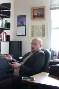 Samuel Claussen, a relatively new addition to the history department, is a medieval Europe scholar. Photo by Madi Schmader - Staff Photographer