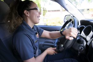 New Campus Safety Officer, Denise Zambrana, smiles and laughs as she reminisces about her time as a security officer at Pepperdine University.  Photo by Roman Valenzuela - Staff Photographer