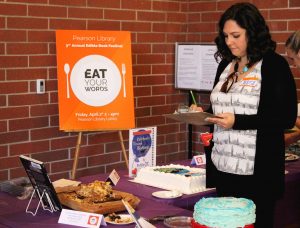 Five contestants participated in the 3rd annual edible book contest at Cal Lutheran. Judge Chiara Lamb observed and tasted the baked goods and decided which participant would be named "best Overall," "Best Tasting" and "Most Creative." Photo by Jackie Rodriguez - Staff Photographer