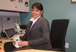 Profession Passion: Professor Anita Stone in her office located in Ahmanson Science Center 122. Her stuffed animal is her favorite primate, a squirrel monkey, which she researches. Photo by Clara Berks- Staff Photographer 