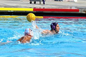 Lifting up: Chris Gardhouse winds up for a shot on goal at Saturday’s game Oct. 29 against Cal Tech. Photo Credit--Annette Sousa Staff Photographer