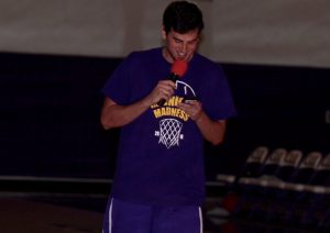 Reagan Chapman announces the Regals and Kingsmen athletes as they walk into the arena. Photo Credit--Jackie Rodriguez Photo Editor 