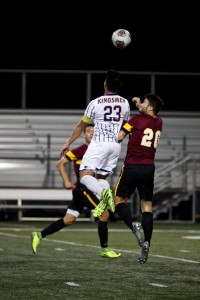 Senior Gabriel Fernando leaps reach a header before CMS opponents can reach it. Photo Credit--Annette Sousa Staff Photographer