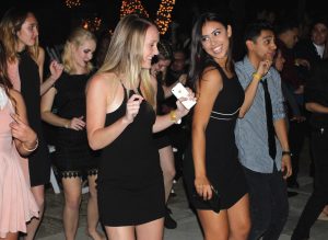 Gambling the night away: (Bottom) Students enjoy the DJ and dance outside at Monte Carlo.