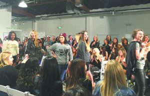 Confident Couture: (L to R) Krystal Rhaburn, Dani Kluss and Bella Lone Elk. (Far right) Laura Willits. Cal Lutheran Her Campus members walk the runway.  Photo courtesy of  Taylor Netter 