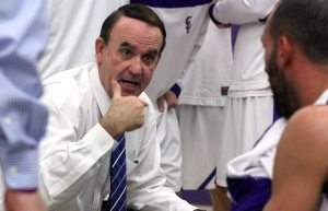 Listen up: Rich Rider talks to his team during a time out to get them ready and amped up to continue playing their game with high intensity.   Photo Credit--Tracy L. Olson Sports Information Director