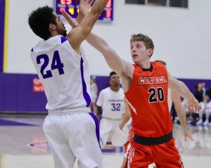 Wolfgang Wood had 18 points, seven steals and three rebounds in the Kingsmen's defeat of Cal Tech on Senior Night. Photo by Mary Crocker--Staff Photographer