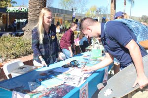 Diving Right In: (L to R) CJ O’Brien and Sawyer Weddle. Weddle signs up for the newly formed CLU Dive Club, expressing interest in future dive trips. Photo by Morgan Mantilla- Staff Photographer 