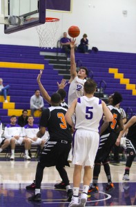 Throwing down: 12 Blake Miles and 5 Kyle Ferreira. Miles was second behind Wood in  points for the Kingsmen with 20 points and helped CLU to a nine point victory against Occidental. Photos by Morgan Mantilla--Staff Photographer