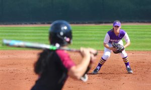 Running past: Makenna Pellerin helped the Regals make a comeback in game one going 3-3. Photos by P.K. Duncan--Staff Photographer