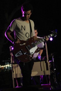 Senior Reed Hallums plays the electric guitar for the first song in the set performed by No Suits called “Escape Reality.” 