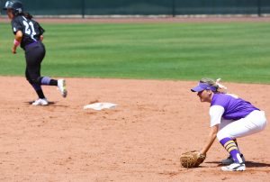 Swinging to victory: Junior second baseman Mikaela Mayhew drove in the winning run for the Regals in game two. Photo by P.K. Duncan--Staff Photographer