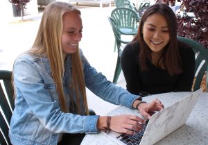 Publicizing Wellness: (L to R) Olivia George and Jacie Fukada. co-founders of Cal Lutheran’s chapter of Spoon University, plan ahead for future events involving food.  Photo by Amanda Souza- Staff Photographer 