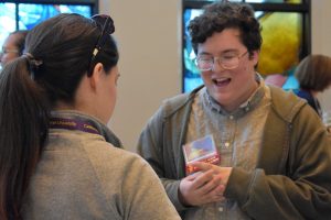 Sharing his story: Kaiden Cole Wilde speaks with attendees of the Arts and Learning Symposium after reading a poem he wrote about his journey with Autism.  Photo by Aliyah Navarro- Photojournalist