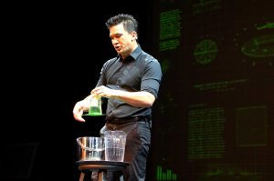 The magic of science: Magician Jason Latimer performing an illusion with water at the STEMtastic! event. Photo provided by Phil Hampton