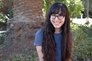 Student and mother: Senior Cynthia Castillo ready to graduate in May 2018 with two degrees alongside a child she had her freshman year. Photo by Natalie Elliott- Photojournalist