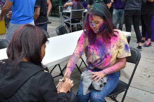 Cal Lutheran student Nicole Ishii has henna painted on her hand. Photo by Natalie Elliott- Photojournalist