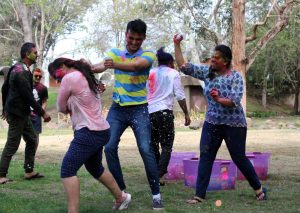 Not on my face: Students smear gulal on each other, making everyone look the same: colorful. Photo by Saoud Albuanain- Photojournalist