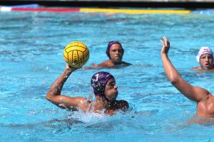 Senior utility player Matt Fong looks for an open teammate to pass to. The Kingsmen were outscored by the Tritons in their season opener. Photo by Arianna Macaluso- Photo Editor