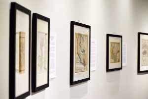 The exhibit "Mapping Meaning: Adventures in Cartography" displays maps collected by former Cal Lutheran professor Ernst F. Tonsing. Photo by Ally Gaskill- photojournalist.