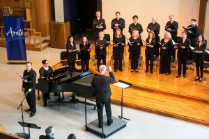 A decade worth singing about: The Areté Vocal Ensemble, which has 36 members this year, will commemorate 10 years of performances in a concert that highlights the work of California-based composers. The concert will be held in Samuelson Chapel at 2 p.m. Nov. 11. Photo provided by Brian Stethem - University Photogapher