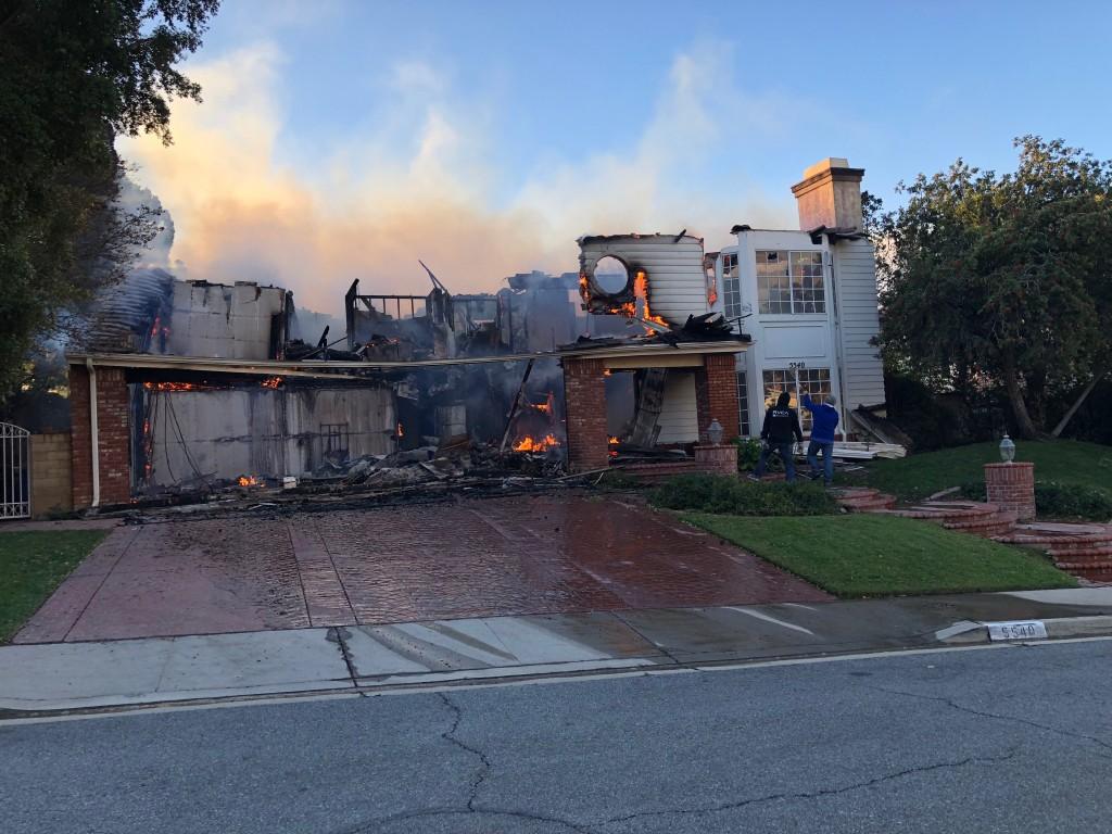 A home in Oak Park, California caught flames in the Woolsey Fire. - Photo provided by Arianna Macaluso