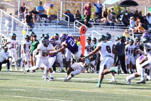 Senior running back Kayden Clements rushed 18 yards during the 26-20 loss against the University of La Verne. Clements averaged 21.6 yards per game for the season and was among the 21 players recognized during the Nov. 3 senior game.  Photo by Arianna Macaluso - Photo Editor