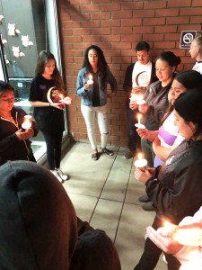 In solidarity: After a march around campus, students hold a candlelight vigil in honor of sexual violence victims around the world. Photo by Spencer Hardie - Photojournalist