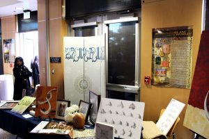 A display on Muslim artifacts at the April 23 Muslim Culture Banquet. Photo by Spencer Hardie- Photojournalist. 